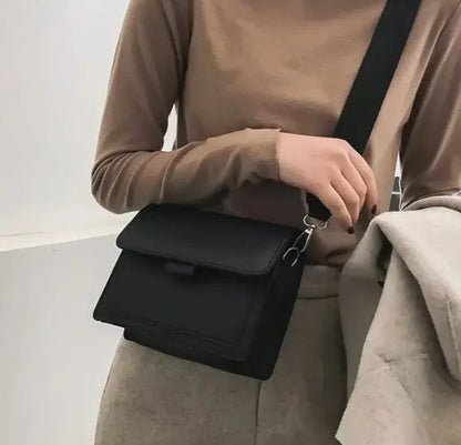 SlingEdge Mini Hand Bag
